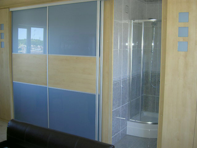 Sliding Mirror and Glass Doors. Fitted Bedrooms and Sliding Doors. Individually Fitted by Newbold bedrooms.