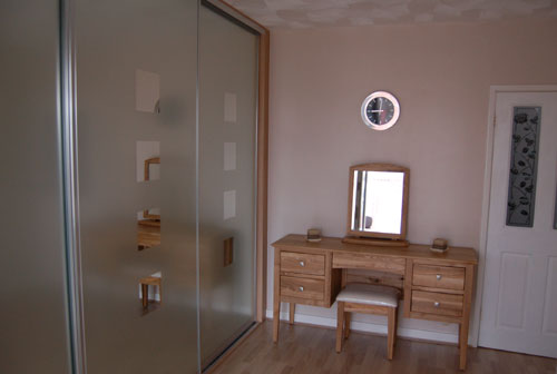 Sliding Mirror and Glass Doors. Fitted Bedrooms and Sliding Doors. Individually Fitted by Newbold bedrooms.