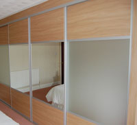 Frosted mirror, mirror and light wood sliding doors