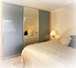 Mirror and coloured glass sliding doors to transform your bedroom, or any other room. A touch of class that can make a big difference...